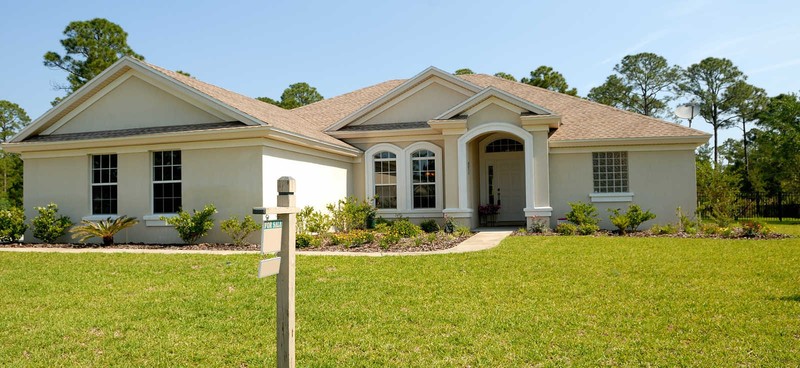 House with for sale sign