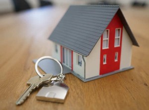 House with for sale sign